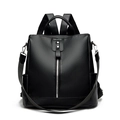 Minimalist black oxford fabric backpack for women with vertical silver zipper and side pockets - Black