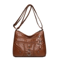 Brown woven crossbody bag with three front zippers and adjustable shoulder strap - Brown
