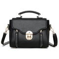 Classic black crossbody bag with gold buckle and textured finish for stylish women - Black