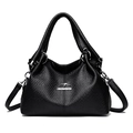 Borsa a mano nera da donna in pelle testurizzata con logo a canguro e tracolla rimovibile - Nero