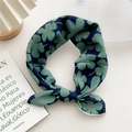 Bandeau à fleurs bleu marine avec nœud central et motifs floraux élégants - Zéphiranthe Vert