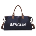 Large capacity navy blue travel bag with brown leather handles and a long shoulder strap - Dark Blue