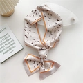 Narrow silk twilly scarf with black bird print and orange borders on cream base - Migratory Birds