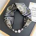 Close-up of silk scarf necklace with vintage compass print and rhinestone magnetic buckle - Black White Gold Compass (3M指南针)