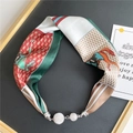 Detailed view of silk scarf necklace with horse print and rhinestone magnetic buckle - Retro Green Horse Small Plaid (5M Green Border)