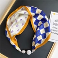 Close-up of silk scarf necklace with magnetic buckle, grid patterns and crystal pendants - Navy & White Plaid Letter R (6M Dashed Check)