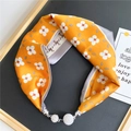 Detail of a bright yellow floral silk scarf featuring a luxury sparkling rhinestone buckle - Bright Yellow & White Four-Petal Flower (10M Round Flower Orange)