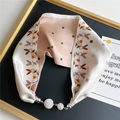 Detailed view of silk scarf necklace featuring cartoon rabbit prints and crystal magnetic clasp - Pink Rabbit Origami
