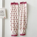 Detail of cream sun sleeves with purple heart pattern and ruffled elastic cuffs - Heartbroken Pink Broken Heart Print
