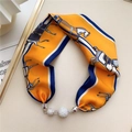 Detail of equestrian print silk scarf necklace with sparkling silver metal ball buckle - Orange Stripe Equestrian