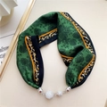 Detail of a green silk scarf with floral patterns and a sparkling rhinestone metal buckle - Green Leopard Floral Line