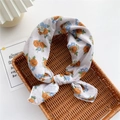 Cotton neck scarf with orange floral pattern on light grey base in wicker basket - Floral 24 (Grey Base Yellow Flower)