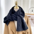 Close-up of black cable knit scarf texture worn over a camel wool coat on a mannequin - 30*185cm / Black