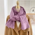 Lavender knitted scarf with cable stitch pattern paired with a classic camel wool coat - Purple