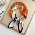 Pleated square scarf featuring orange and navy blue color-block with chain print - Orange Knight Helmet Pattern
