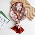 Narrow silk scarf with red geometric pixel pattern and contrast border on white background - Red Pixel Geometric
