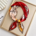 Pleated square scarf with red and yellow floral patterns on a decorative tray - Floral Umbrella Red