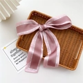 Elegant pink satin ribbon hair tie with fashion text on a woven tray - Pink Red Patchwork