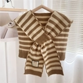 Detail of striped knitted shawl featuring a logo patch and soft thick wool texture - Khaki Striped