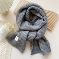 Chic grey chunky knit scarf for women with soft texture and minimalist woven label - 32x175cm / Gray