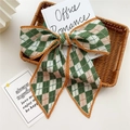 Long pleated scarf with green and white checkerboard pattern and orange border detail - Pleated Two-Tone Rhombus Green