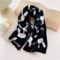 Black and white knit scarf featuring a cute bunny pattern and bunny text detail - Black