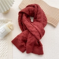 Thick red knitted scarf featuring classic cable knit pattern and ribbed edges for winter - Dark Red