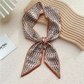 Twilly à pois marron et crème, noué pour montrer un motif géométrique chic et fin - Huit Lignes Pois Orange (24F)