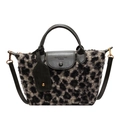 Borsa leopardata in peluche con finiture in ecopelle verde scuro e tracolla regolabile - Verde
