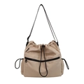 Khaki nylon drawstring bucket bag with black zipper pocket and adjustable strap - Apricot