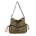 Olive green nylon drawstring bucket bag with black adjustable strap and side pockets - Green