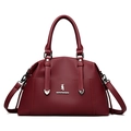 Borsa tote bordeaux in pelle martellata con logo uccello argento e tracolla regolabile - Rosso