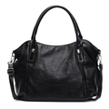Black PU leather tote bag with soft texture and adjustable strap for daily commute - Black