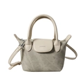 Mini canvas bucket bag in grass green with off-white leather handles and flap - Off White