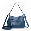 Dark blue minimalist multi-pocket shoulder bag for women with adjustable strap on white background - Blue
