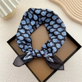 Navy blue paisley print cotton-linen scarf displayed in an elegant gift box - Black Peacock Feather Pattern
