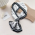 Elegant black and white long silk scarf with script letter print for versatile styling - Black and White Letter Print