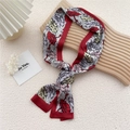 Elegant long skinny silk scarf with red floral patterns on a wooden tray decor - Floral Wine Red