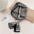Elegant long silk scarf featuring a classic black and white houndstooth pattern design - Houndstooth Rose