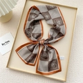 Narrow silk scarf with brown houndstooth and white rose pattern in a bow shape - Orange Rose Houndstooth (2X)