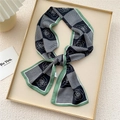 Elegant houndstooth and rose print twilly silk scarf with a vibrant green border - Green Rose Houndstooth (1X)