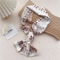 Narrow silk twilly scarf with cartoon rabbit and floral print in cream and pink - Rabbit Origami