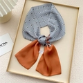 Fashionable gray and orange floral silk scarf in a minimalist gold tray presentation - Orange Plaid Darts (18X)