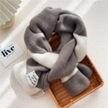 Knit scarf with dark brown and cream color blocks and a white stitched brand label - Coffee Beige Striped