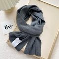 Long knitted scarf in dark grey featuring a classic vertical ribbed texture and soft finish - 22x150cm / Charcoal Gray
