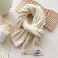 Thick cream cable knit scarf for women featuring a minimalist woven brand label - 12.6x70.8 Inch / Cream