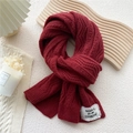 Thick dark red cable knit scarf for women featuring a minimalist white decorative label - 12.6x70.8 Inch / Dark Red