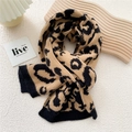 Thick knitted winter scarf featuring classic leopard print pattern in camel and black - Camel Leopard Print