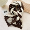 Thick knit winter scarf featuring brown and white argyle pattern for cozy warmth - Brown Big Argyle