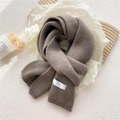 Deep camel thick knit scarf with textured ribbing and minimal woven brand label - Coffee